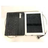 iPad 2 w/ charging cord and keyboard base