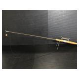 Wood handled ice fishing pole