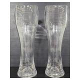 Two tall plastic beer cups