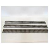 Three train track pieces