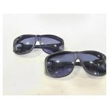 Two pairs of Solar Shield sun glasses