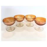 Four vintage carnival glass sherbet dishes