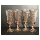 Four vintage pink swirl stemmed glasses