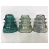 Three hemingray glass phone insulators