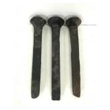 Three steel black coated stakes