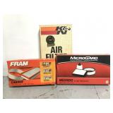 Three assorted air filters in original boxes