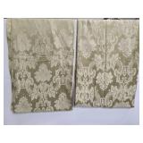 Pair of green ornate curtain panels