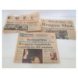 Three vintage newspapers on Reagan