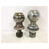 Two assorted tow pintles