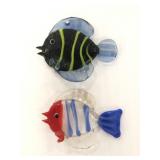 Two petite glass fish pendants