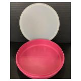 Vintage pink Tupperware container with lid