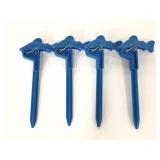 Four Shark plastic stake clamps