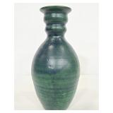 Marked green pottery vase