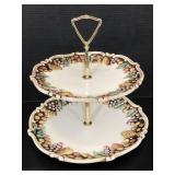 Two tier serving dish with raised fruit decoration