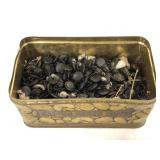 Small tin of vintage black buttons