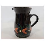 Stamped pottery creamer