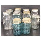 Ten assorted jars with lids