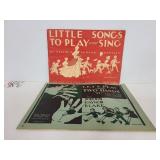 Two vintage childrens song books