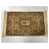 Small area rug with fringe