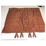 Pair of gold and red split curtains