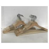 Two new & unopened packs of 8 wood hangers