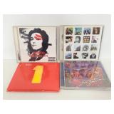 Madonna, Beatles, Bon Jovi & Santana CDs