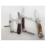 Four vintage pocket knives