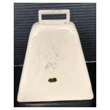 Tan painted metal cowbell