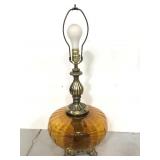 Metal and amber glass globe table lamp