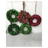 Lot of five Christmas wreaths and three hangers