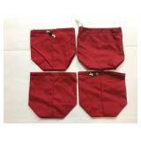 Four matching red camping style hand bags