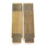 Two Lufkin collapsible measuring sticks