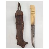 Knife w/ carved bone handle and leather sheath