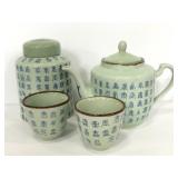Japanese ceramic tea pot, cups, and ginger jar