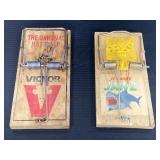 Two huge wooden rat traps
