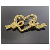 Gold tone heart ribbon brooch