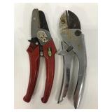 Two assorted pair of heldheld trimmers