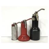 Three assorted metal oil cans w/ spouts