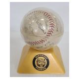 Signed baseball in case