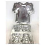 Two vintage tin cake mold pans