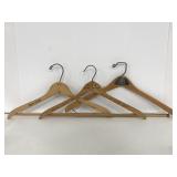 Lot of three assorted wood clothing hangers