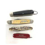 Four small pocket knife tools