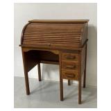 Antique wooden roll-top writing desk