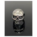 Silver toned smiling skull ring