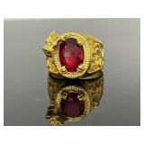 Gold toned Dragon ring with oval red stone