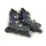 XCS purple and gray roller skates