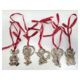 Five Gorham metal ornaments