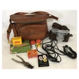 Vintage Nikon camera with bag and accessories