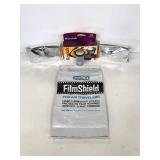 Three Kodak disposal cameras, film, and FilmShield