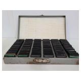 Vintage glass slides in metal case